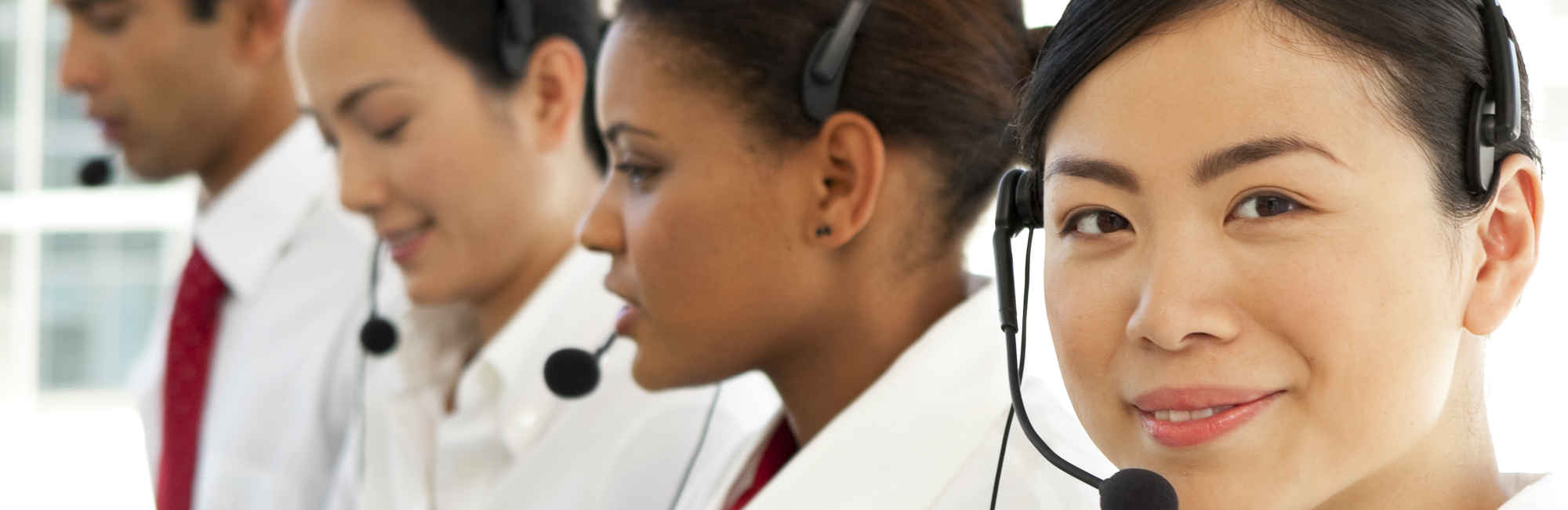 Call Center Employees with Headsets